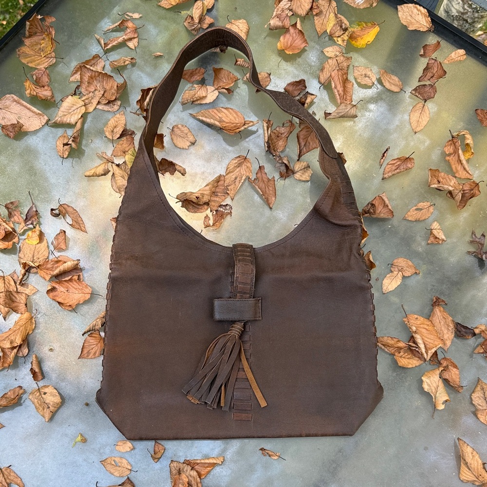 Elegant Brown Hobo Bag with Tassel Accent